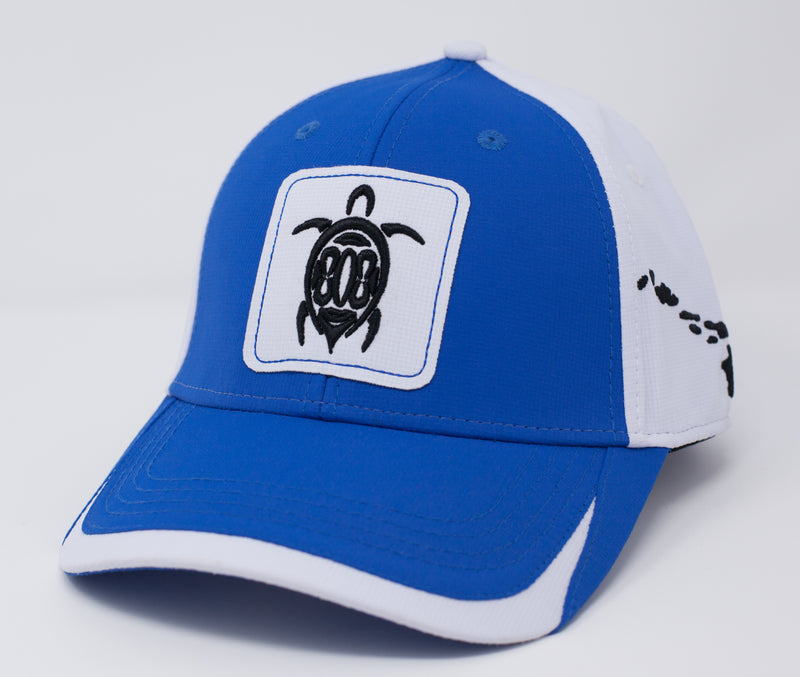 Blue and white sports cap. Turtle with 808 embroidered on front and Hawaiian islands on left side. Buckle Closure.